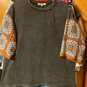 Gimmicks washed black top with Crochet Sleeves